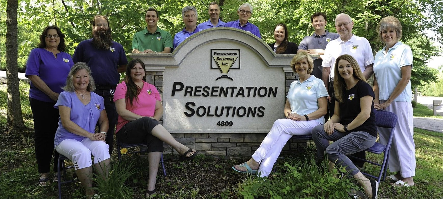 Presentation Solutions' Team Ready to Deliver Poster Printers and Award Makers to Your School! Presentation Solutions' Team Standing outside their office ready to supply poster makers for schools.
