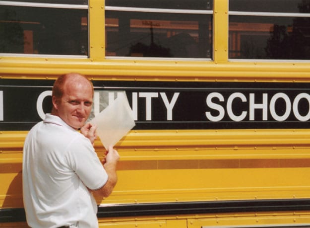 school bus marked with school name