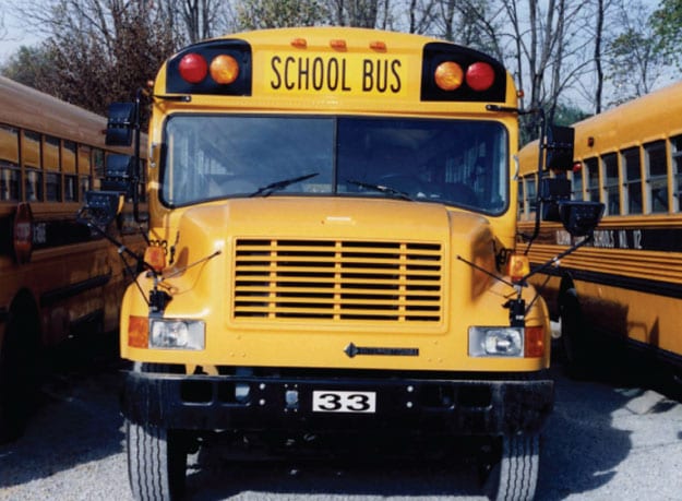 A school bus with a printed number on front