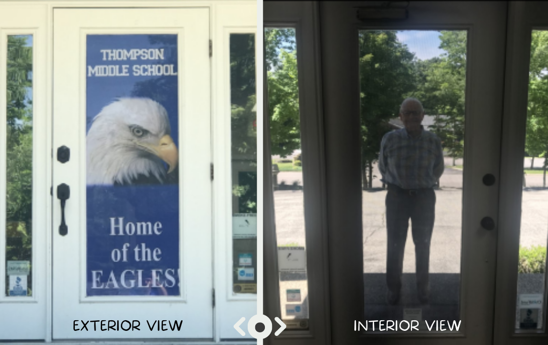 Door with Secure view poster that lets you see out, no one can see in