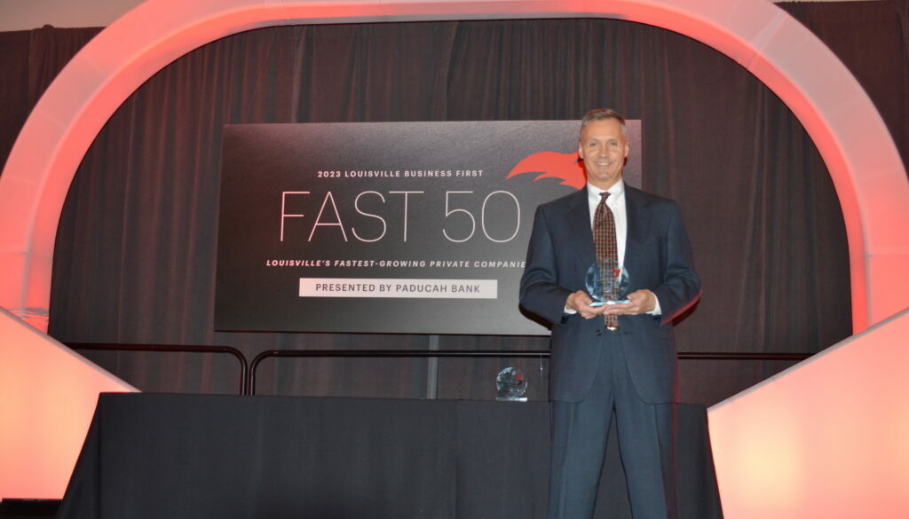 Joe Powell receiving Kentucky's Fast 50 Award