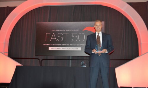 Joe Powell receiving Kentucky's Fast 50 Award